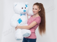 Белый плюшевый мишка с латками
